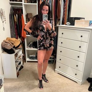 Sexy black romper with sleeve cut outs